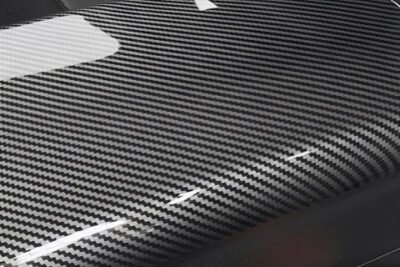 Piesă auto din plastic cu aspect carbon look – imitație vizuală a fibrei de carbon, fără rezistență sau beneficii reale – exemplu tuning aftermarket