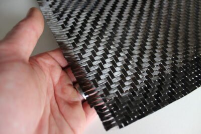 Piese din Fibră de Carbon: De Ce Sunt Alegerea Ideală în Tuning Auto Material fibra de carbon folosit pentru tuning auto BMW,Mercedes,Audi